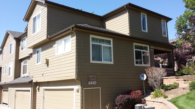 Back of unit shows 3 levels (garage/storage, main level, bedrooms upstairs. - 6440 Silver Mesa Dr