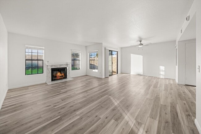 Building Photo - Large Renovated 3bed x 2.5bath Townhouse with Private Patio & 2-Car Garage