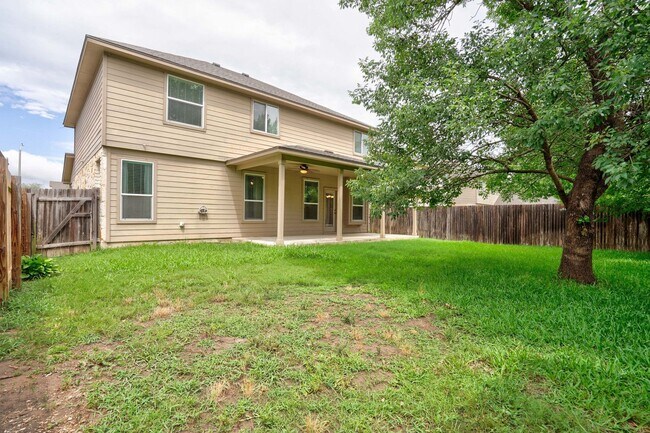 Building Photo - Bright & Roomy 4BR • 2.5BA • Two-Level Living