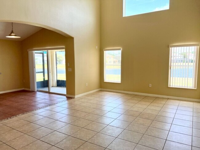 Building Photo - EAGLE CREEK LAKE NONA! WELCOME HOME! Beautiful water views! Spacious 2 story-3 bedroom 2.5 bath h...