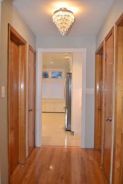 Hallway to bedrooms and kitchen - 5342 W Sunnyside Ave