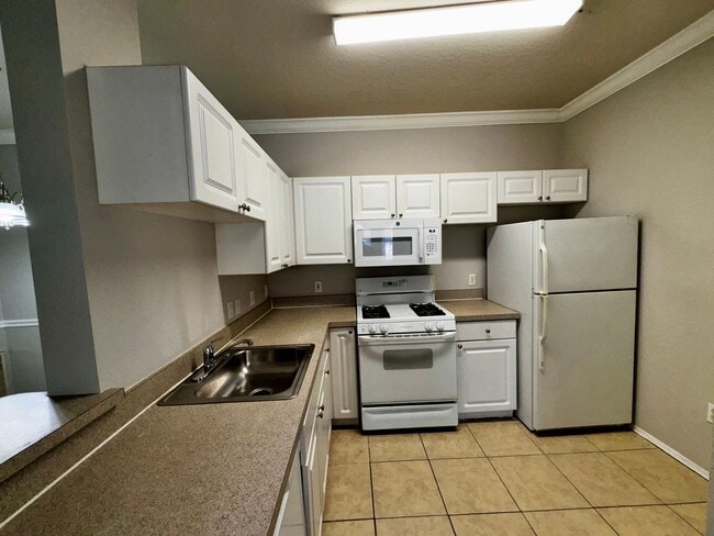 Building Photo - Spacious 2 Bed / 2 Bath Second-Floor Condo at Grand Reserve at Kirkman Park