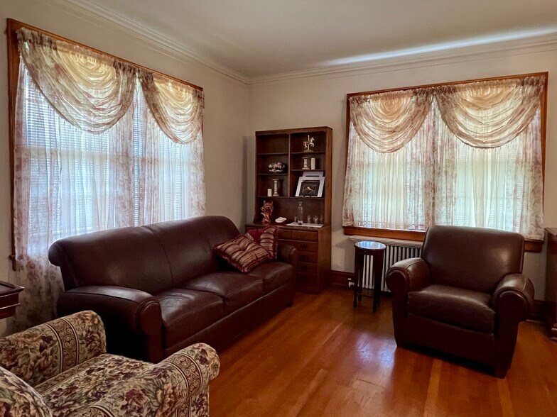 Living room. Shared. Board games and Monopoly table. - 209 Main St