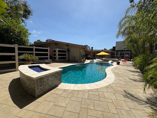 Building Photo - Luxurious Oasis with Resort-Style Pool and...
