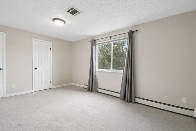 Building Photo - Townhome-Style Living with Greenbelt Views, Attached Garage & Community Pool!
