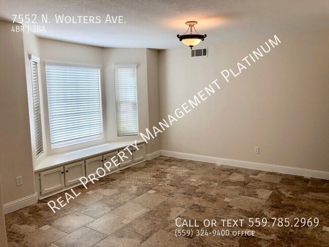 Building Photo - 7552 N Wolters Ave