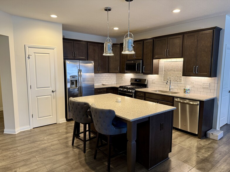 Kitchen w/ Island & Pantry - 6120 Jadkins Way