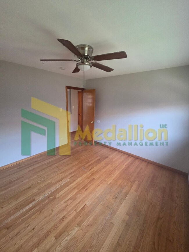 Building Photo - Spacious 6-Bedroom Home with Finished Basement and Backyard