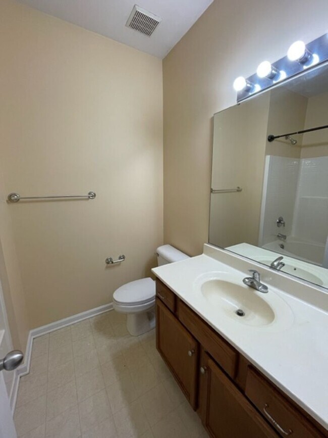 Building Photo - Come take a look at this end unit 3 bedroom, 2.5 bath townhouse located in very desirable FORT MI...