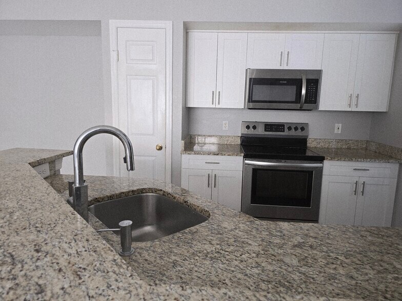 Building Photo - 9058 Lake Chase Island Way