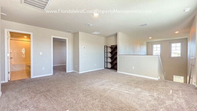 Building Photo - BRILLIANT and SPACIOUS! 4 BEDROOM/2.5 BATH PLUS LARGE BONUS-FLEX SPACE and FENCED YARD!