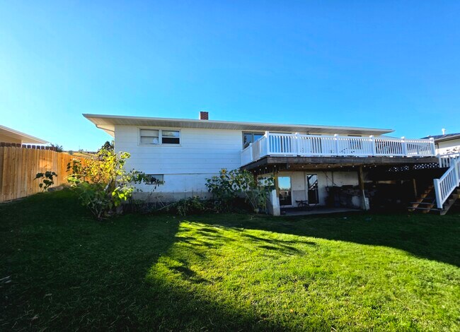 Back of house with deck - 1409 2nd West Hill Dr