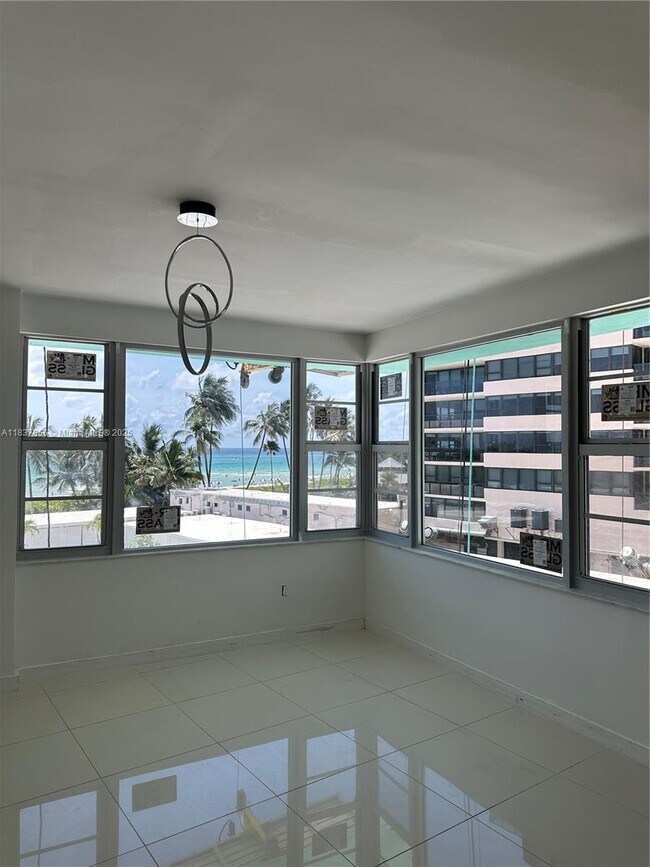 Building Photo - 5255 Collins Ave