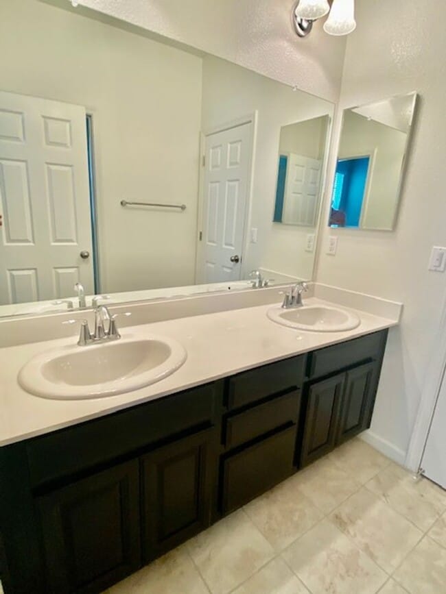 Building Photo - ALMOST NEW, UNIQUE 4 BEDROOM, 3 BATH, 2 CA...