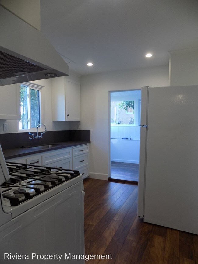 Building Photo - 6675-6677 Electric Ave