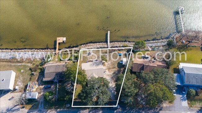 Building Photo - Stunning 4-Bedroom, 3-Bath Waterfront Home in Choctaw Beach – 140ft of Bayfront Bliss!