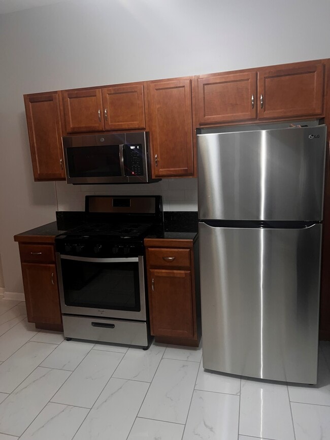 Kitchen stove, range and refrigerator - 1203 Fair Ave