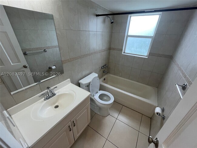 Building Photo - 8560 N Sherman Cir