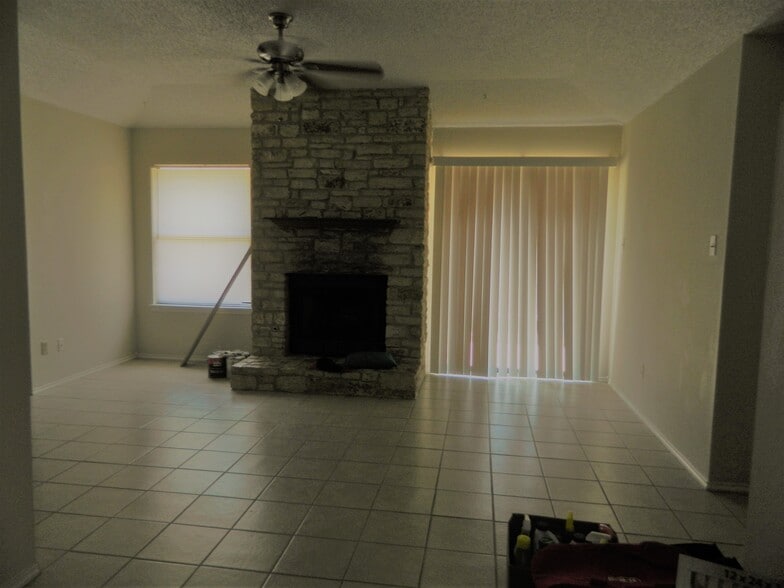 view from Dining Area to Fire Place and Slider to Patio - 7806-B Chimayo Cv.,
