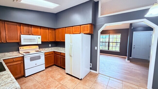 Building Photo - $500 OFF A MONTHS OF RENT IF YOU APPLY BEFORE MAY 12TH. Pet-Friendly 3BR Home with Spacious Yard ...
