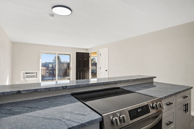 Building Photo - 2-Bedroom Gem with Granite Countertops Available in May