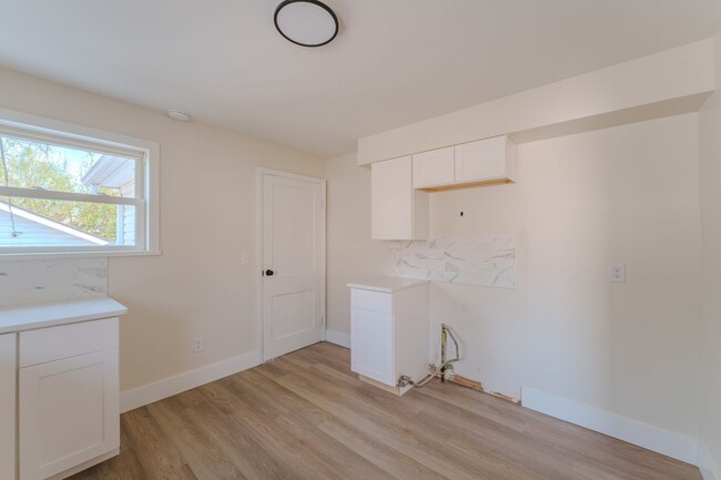 Building Photo - Remodeled 2 bedroom with off street parkin...