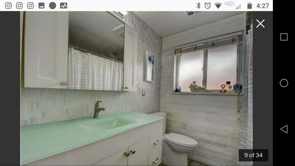 Beautiful updated bathroom with a blend of modern and rustic charms. - 1808A Simms St