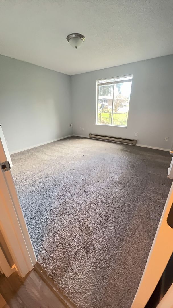 Building Photo - Ground-Level Unit in a Fourplex Near Tacoma Mall