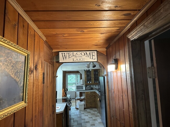 Building Photo - Peaceful Waterfront Living: 2-Story Home on River Road with Ample Outdoor Storage & Water Extras!