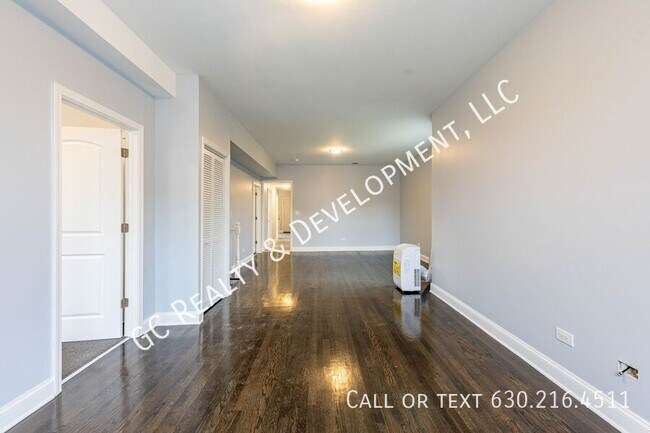 Building Photo - 6433 S Vernon Ave