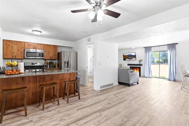 Building Photo - "Spacious 3-Bed Oasis with Fireplace & Modern Vinyl Touches in Ogden"