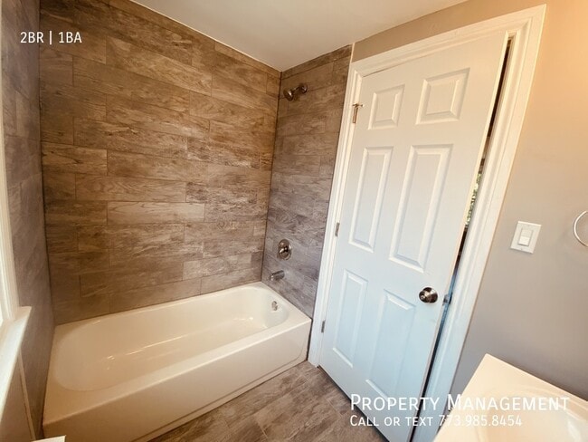 Building Photo - 8153 S Colfax Ave