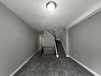 Building Photo - 3 Bedrooms Plus den