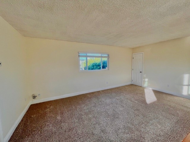 Living room with coat or addit. storage closet on right side - 4033 Van Dyke Ave