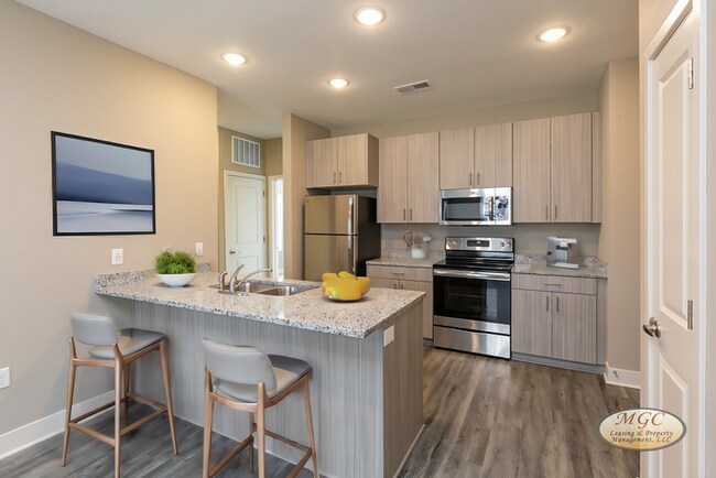 Building Photo - Welcome to Brighton Crossing apartments — ...