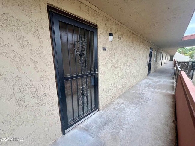 Building Photo - 7625 E Camelback Rd