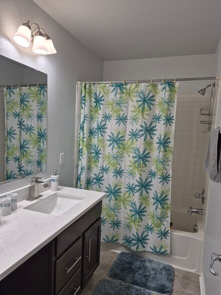 Bathroom for bedroom 2 + 3 - 4441 S Johnson Ct