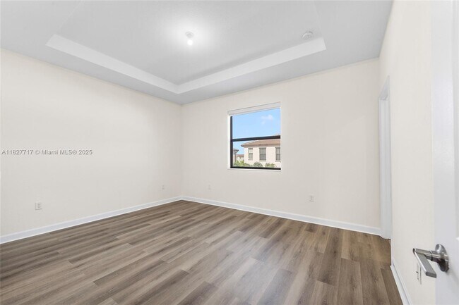 Building Photo - 11120 W 32nd Ln