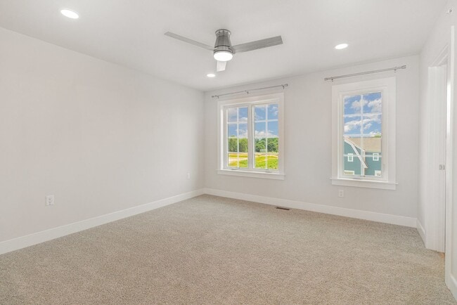 Building Photo - Modern 2025 Townhome | Open-Concept Living, Chef’s Kitchen with Large Island & 2-Car Garage