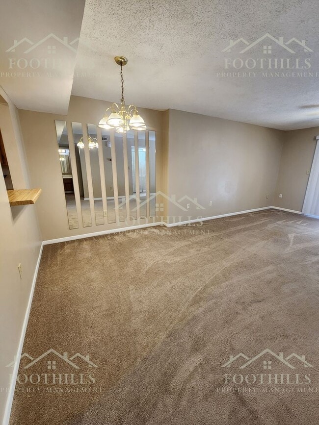 Building Photo - Bright 2-Bed, 2-Bath Condo Near Darwin Wri...