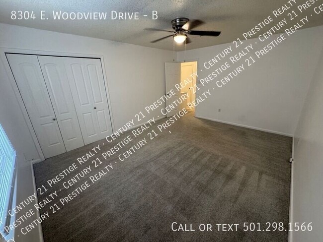 Building Photo - 8304 Woodview Dr N