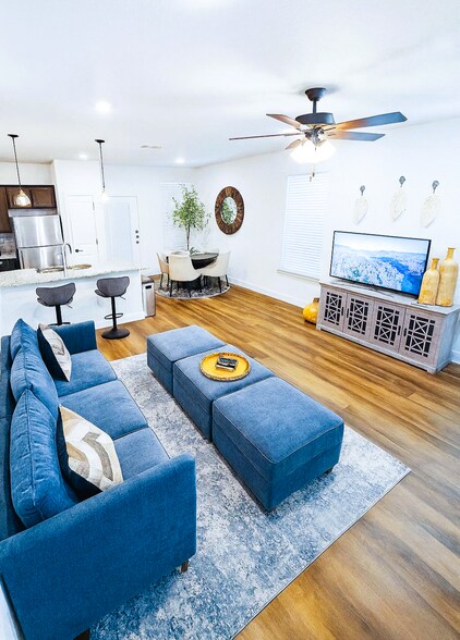 Living Room. This home is offered unfurnished. Staging furniture shown is not included. - 13810 Enzo Gate