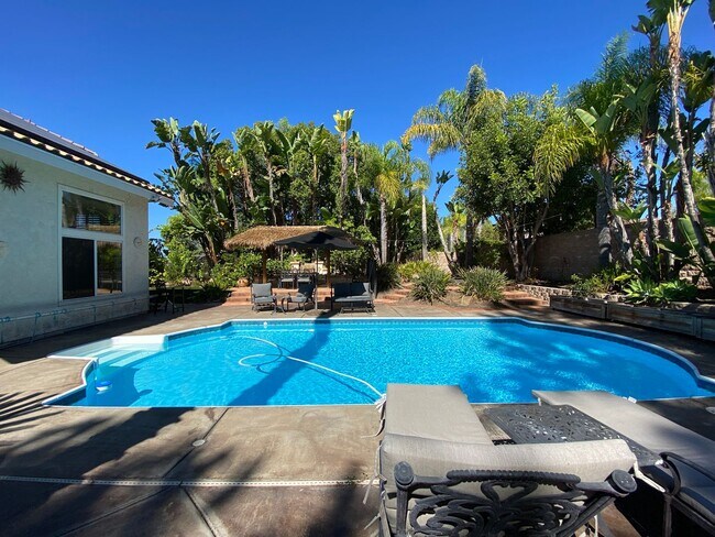 Building Photo - Stunning 4 bedroom Home with a Pool locate...