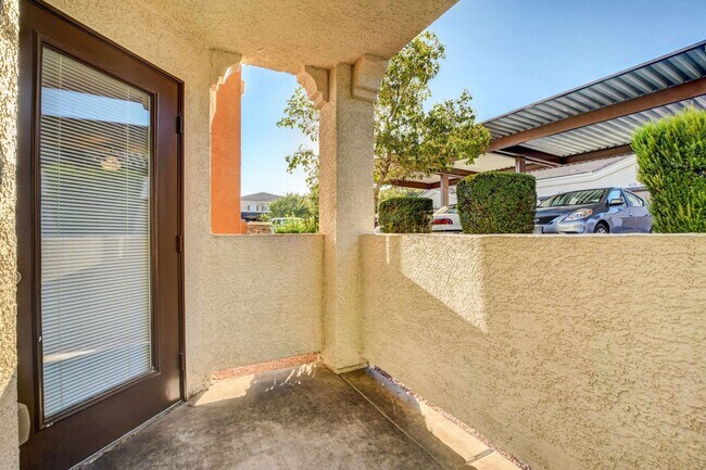 Building Photo - FIRST FLOOR CONDO IN GATED COMMUNITY W/ SINGLE CAR GARAGE