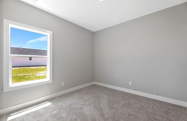 Building Photo - Modern 3-Bed Ranch in Maize – Zero-Entry L...
