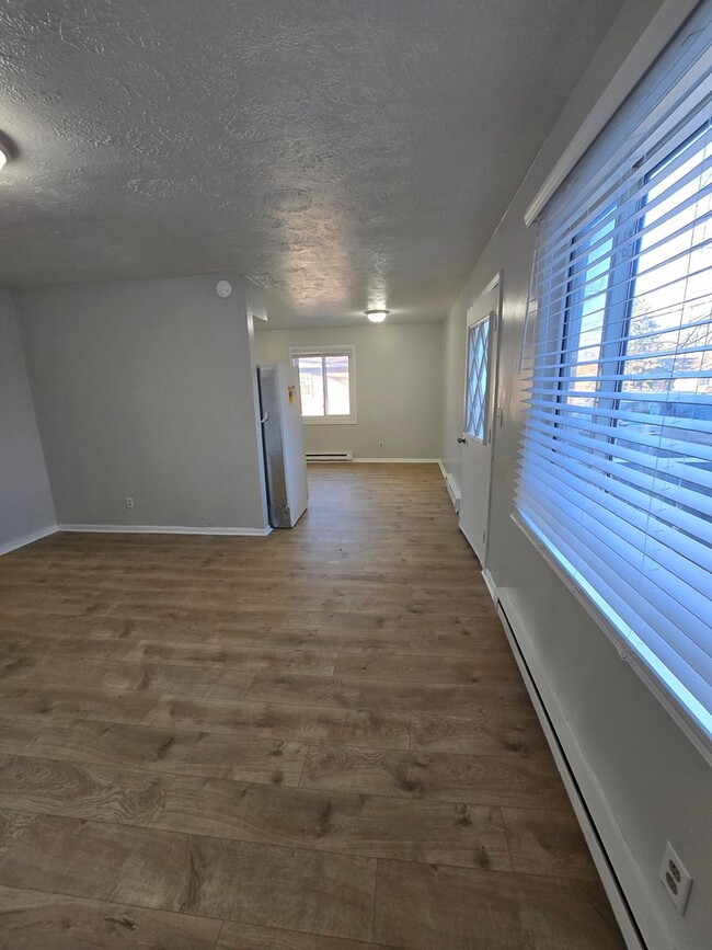 Building Photo - SPACIOUS THREE BEDROOM HOME LOCATED NEAR 2...