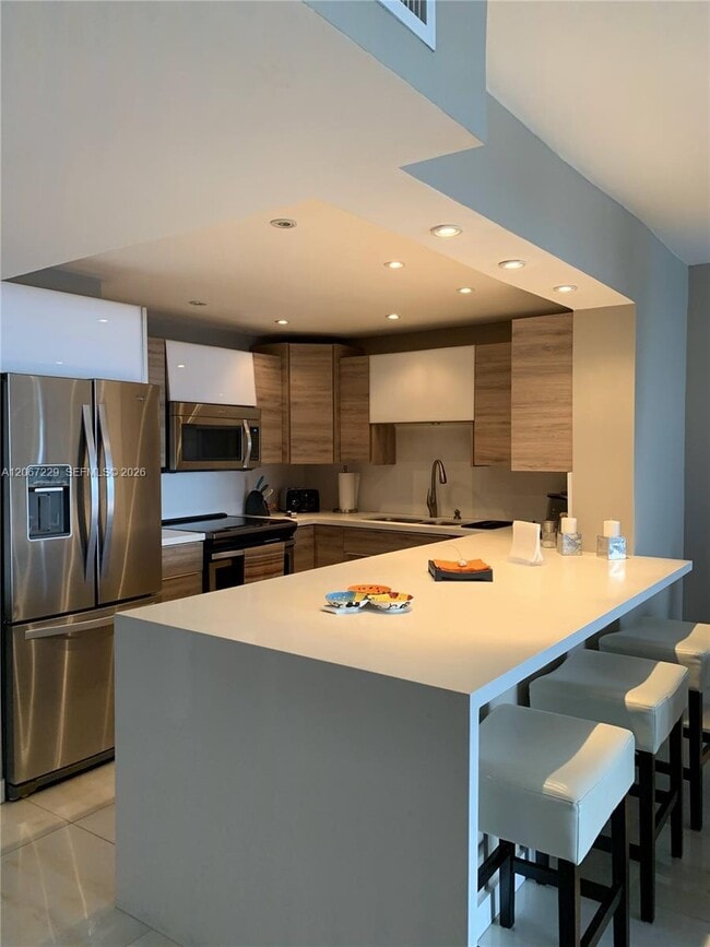 Building Photo - 5701 Collins Ave