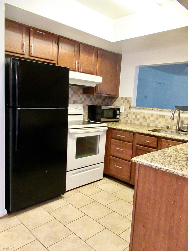 Building Photo - 2 br, 2 bath  - 8009 Greenspring Way Apt F
