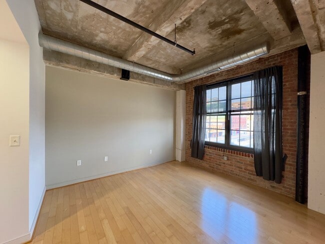 Building Photo - Stunning Industrial-Contemporary One Bedroom Condo- Parking included!