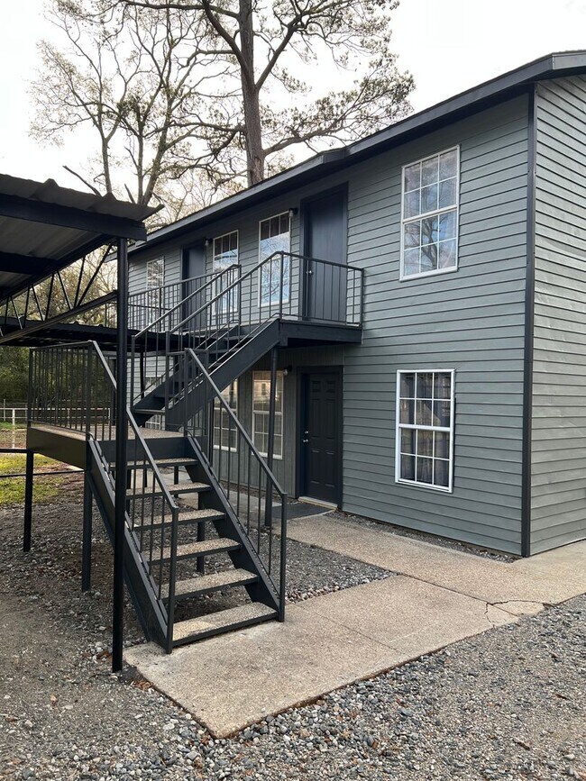 Building Photo - Remodeled Suburban Apartment